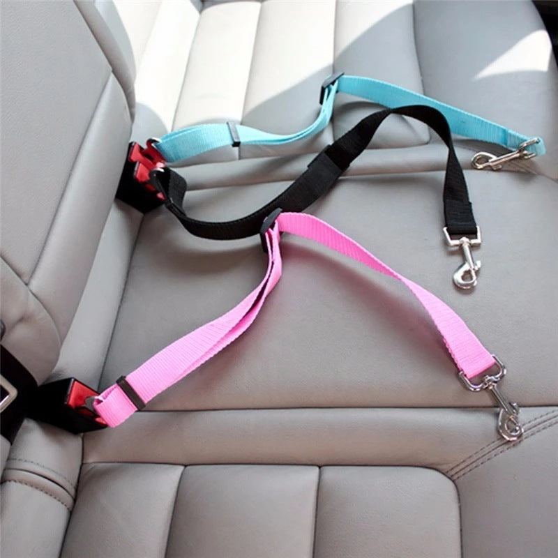 Adjustable car seat belt harness for pets, designed for dogs and cats with a lead clip, traction control, and collars for added comfort and safety