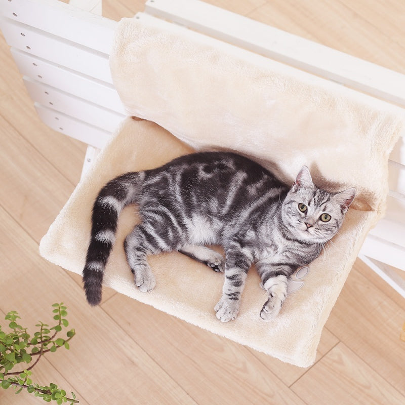 Plush cat bed hammock, offering a cozy and comfortable resting space for cats, measuring 46x30x25 cm.