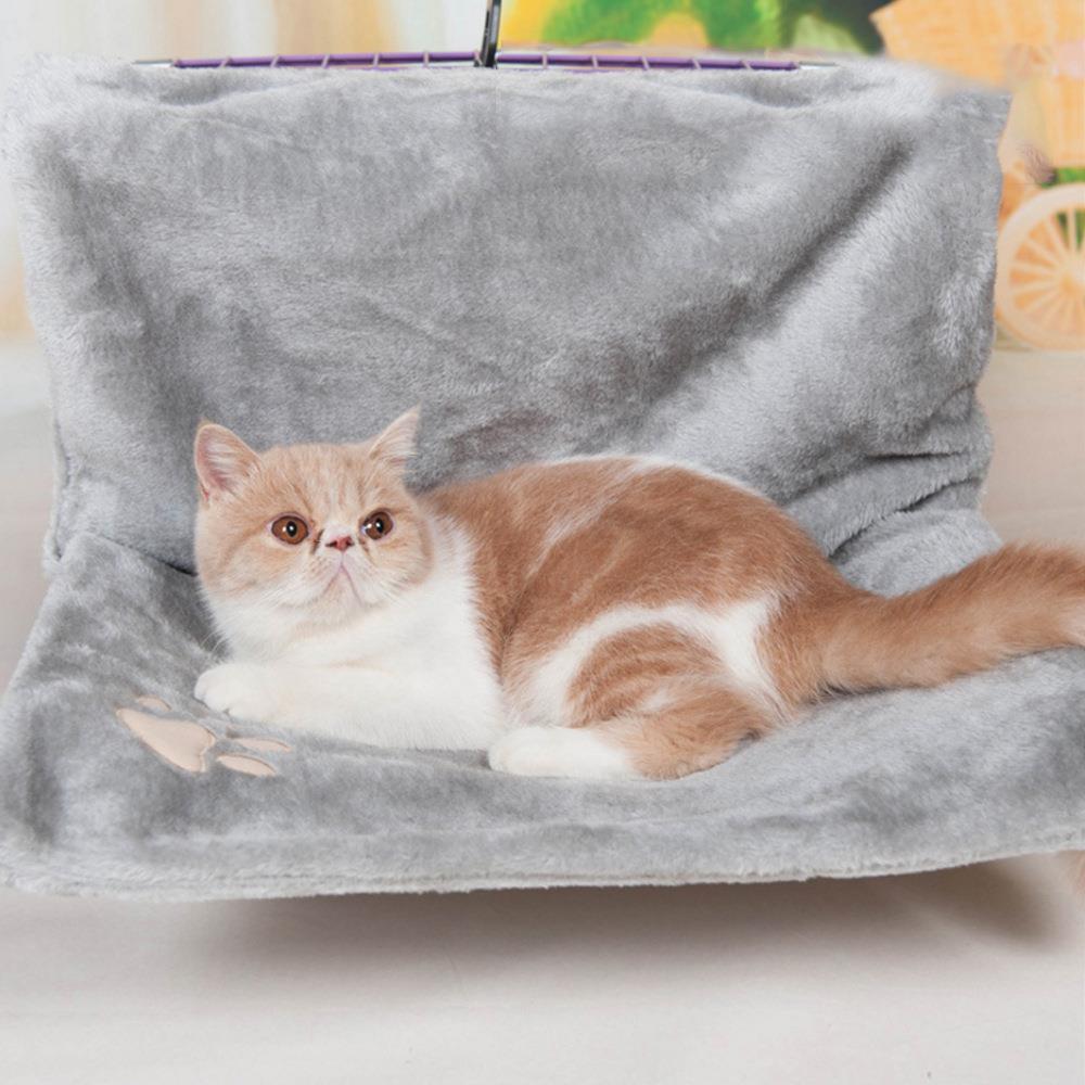 Plush cat bed hammock, offering a cozy and comfortable resting space for cats, measuring 46x30x25 cm.