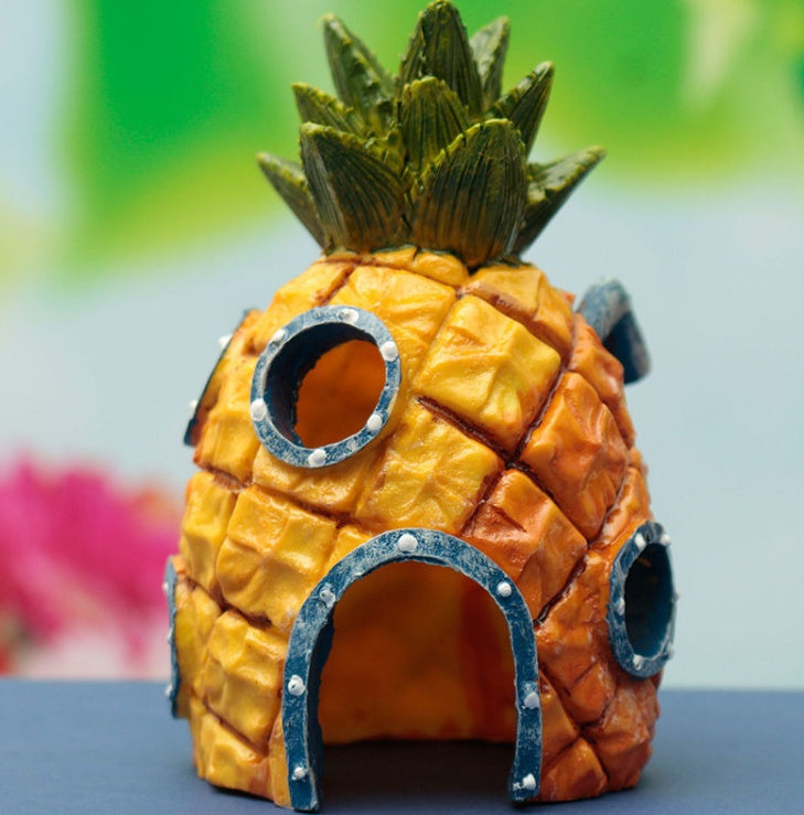 Pineapple Head Room Aquarium Decoration made of safe resin, perfect for adding fun and style to fish tanks and home decor.